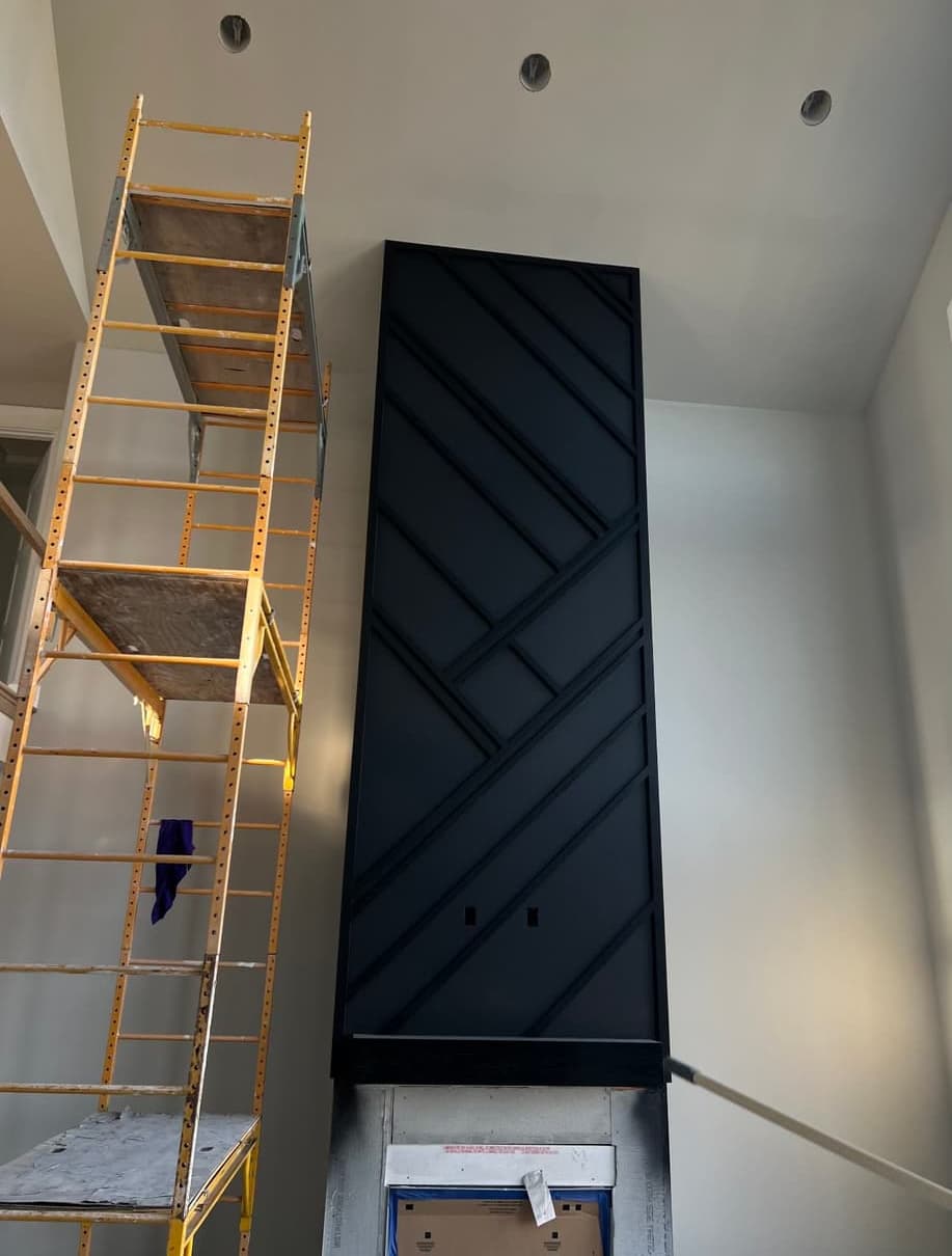 Black accent panel — fireplace
